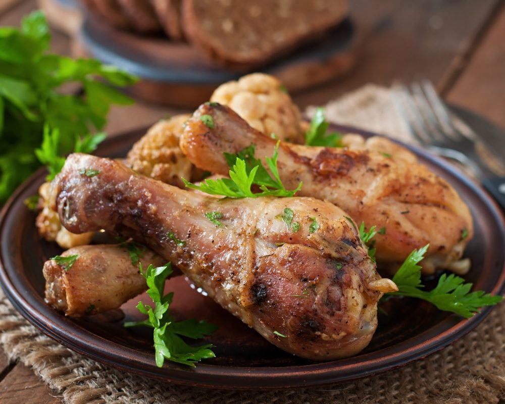 Chicken leg with baked cauliflower and parsley
