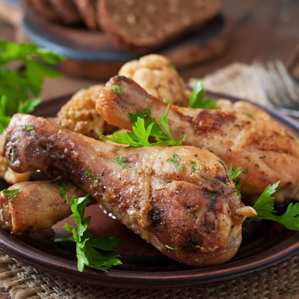Chicken leg with baked cauliflower and parsley